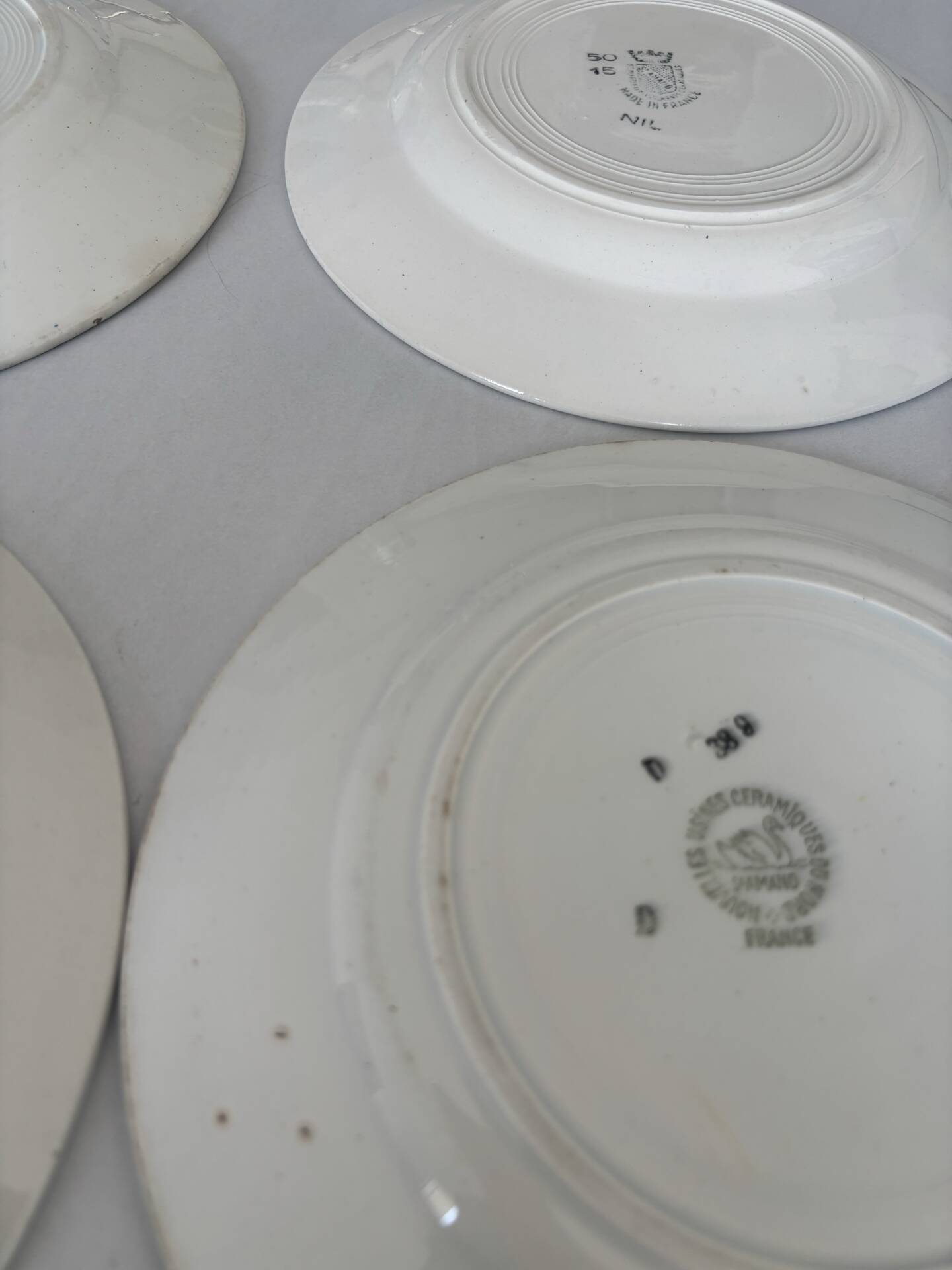 Lot of 4 antique earthenware plates from 1950, Saint Amand - plates bl