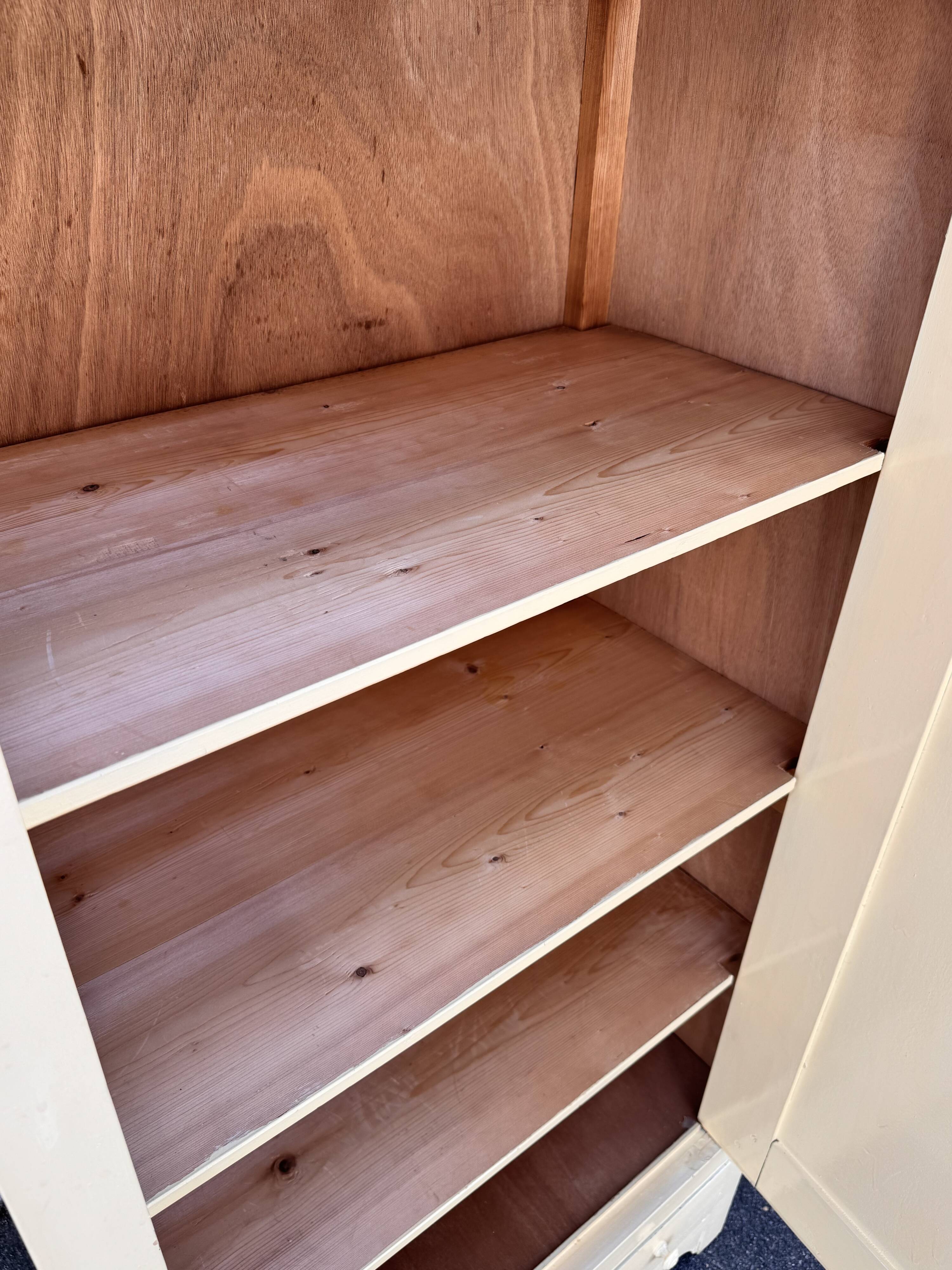 Antique painted wooden bonnet maker