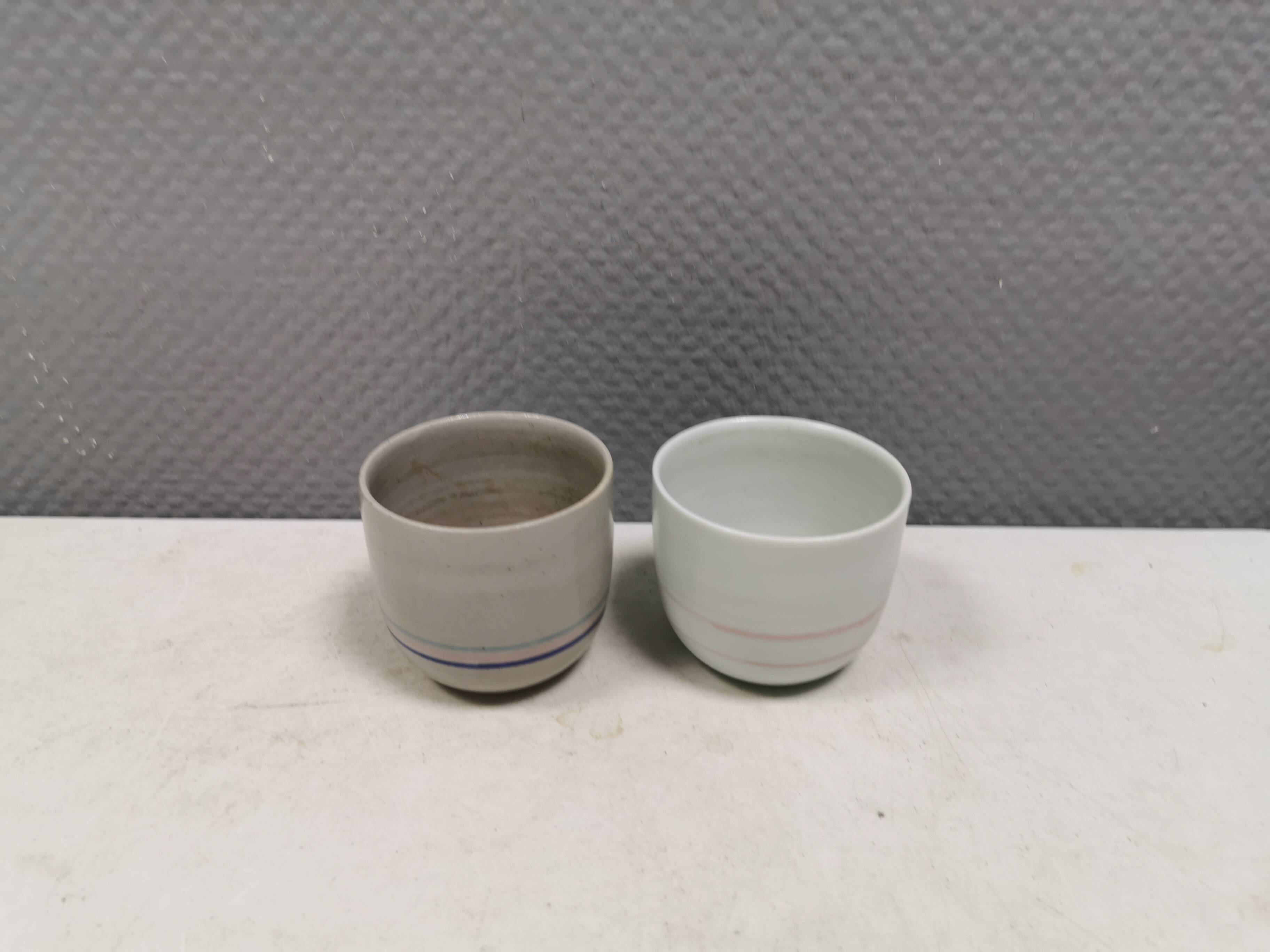 Two handmade ceramic mugs by Vibeke Fischer (VF) from the 1990s.