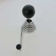 "Streamline" wall coat rack in chromed metal and black lacquered wood, 1970.