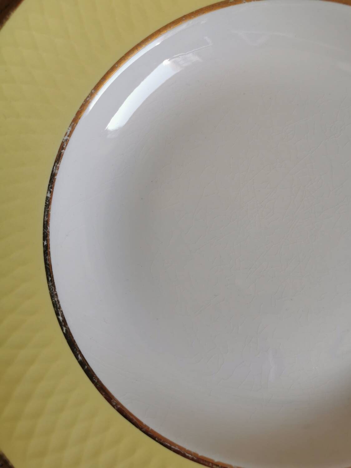Vintage mismatched yellow and gold soup plates