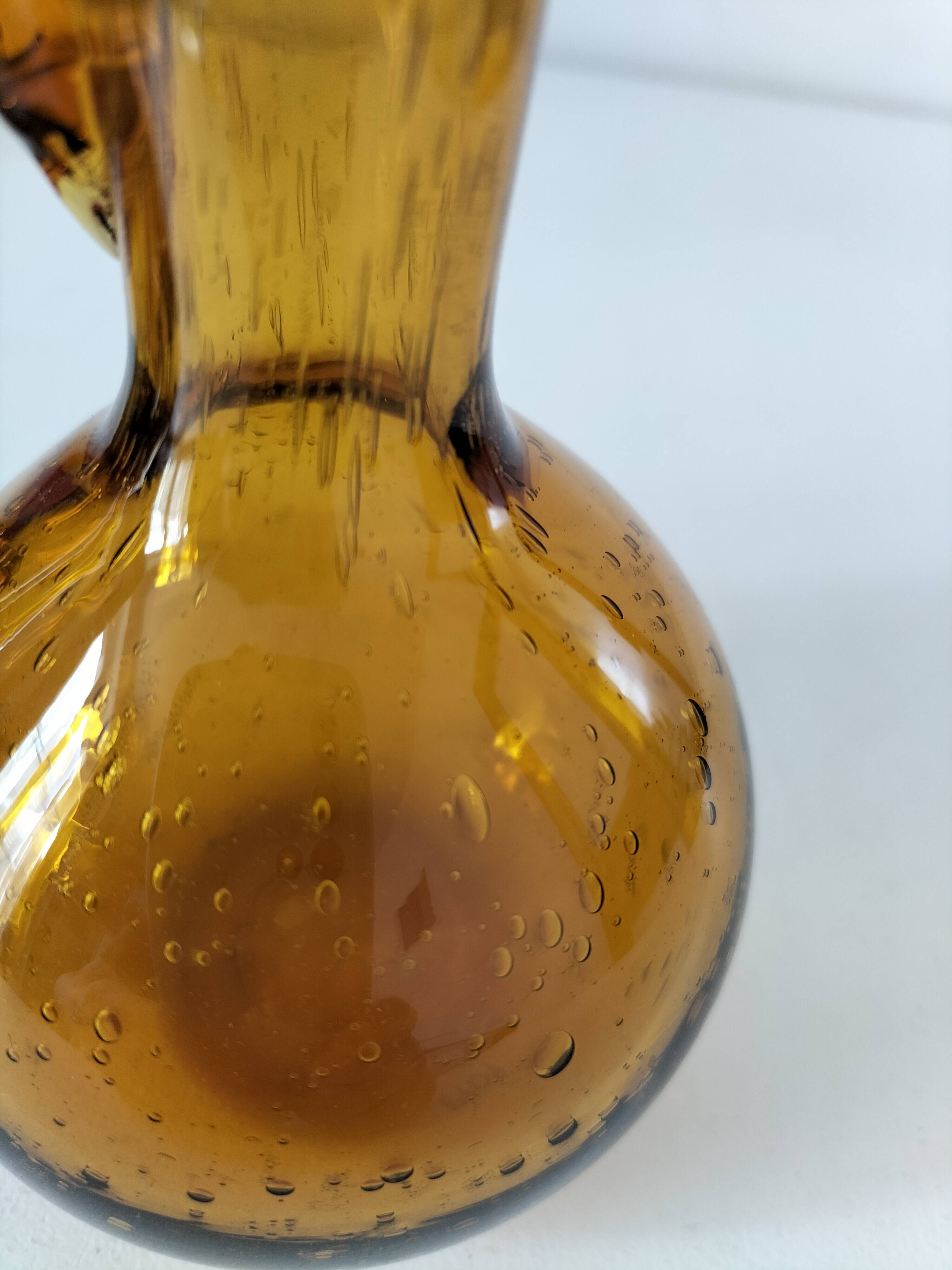 Duo of blown glass carafes – Biot signed – Bubbled amber glass