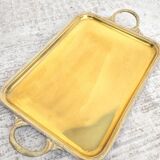 Old serving tray in gilded brass