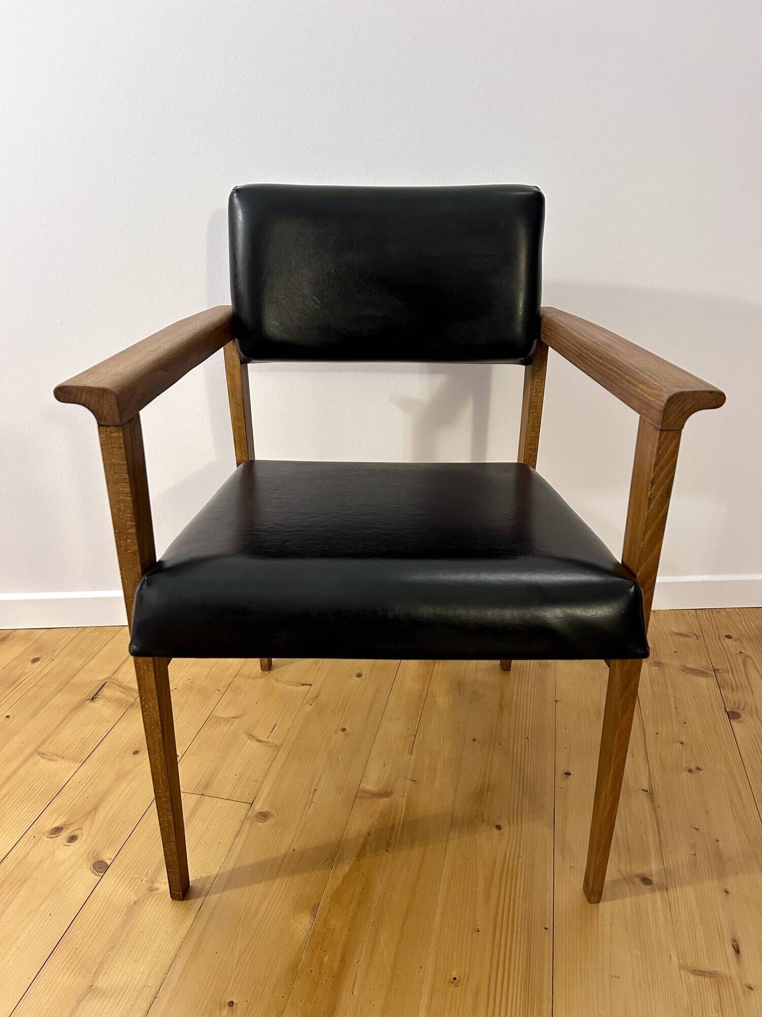 Mid-Century faux leather and wood armchair
