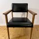 Mid-Century faux leather and wood armchair