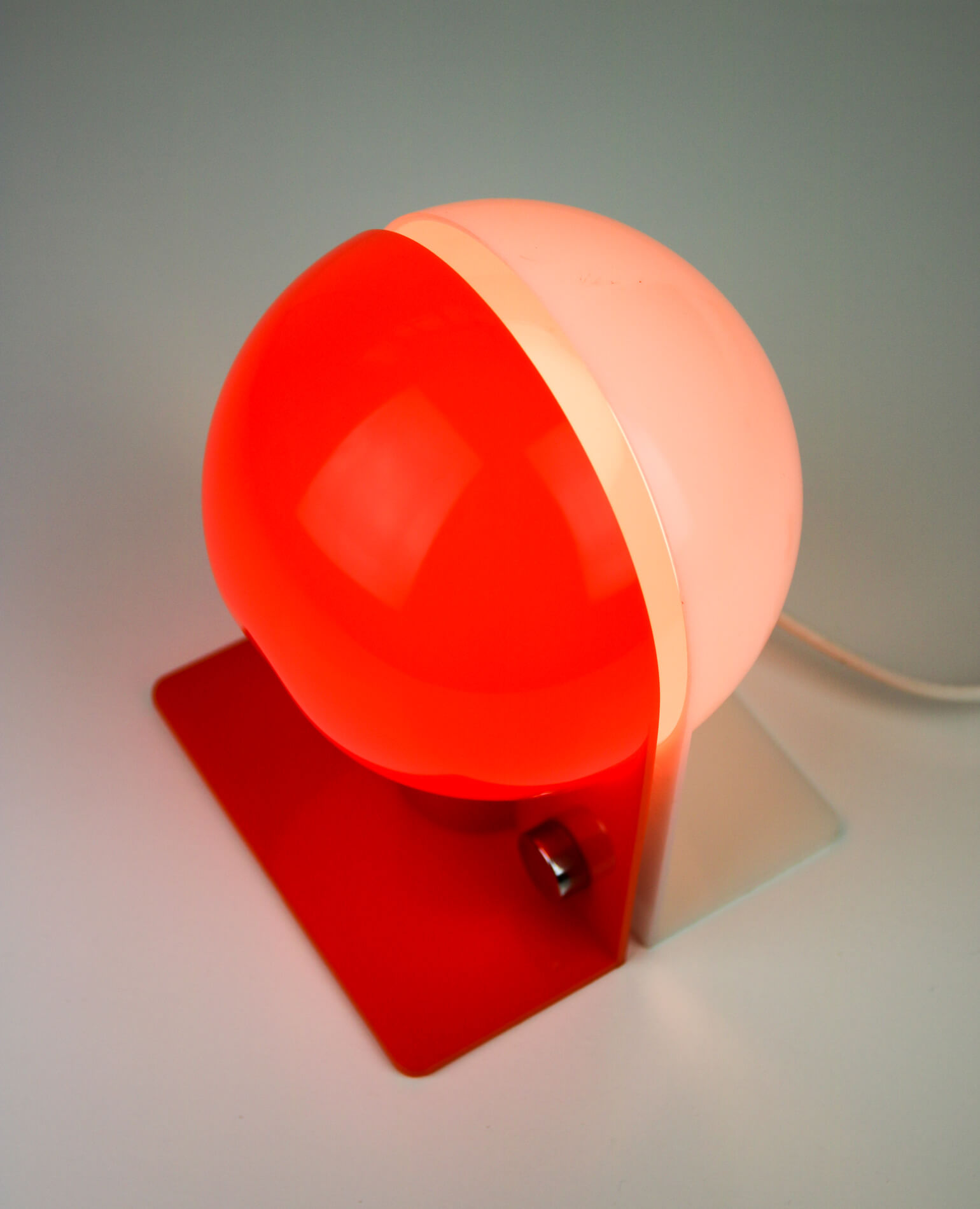Space Age orange table lamp from Sergio Brazzoli for Guzzini, 1970s