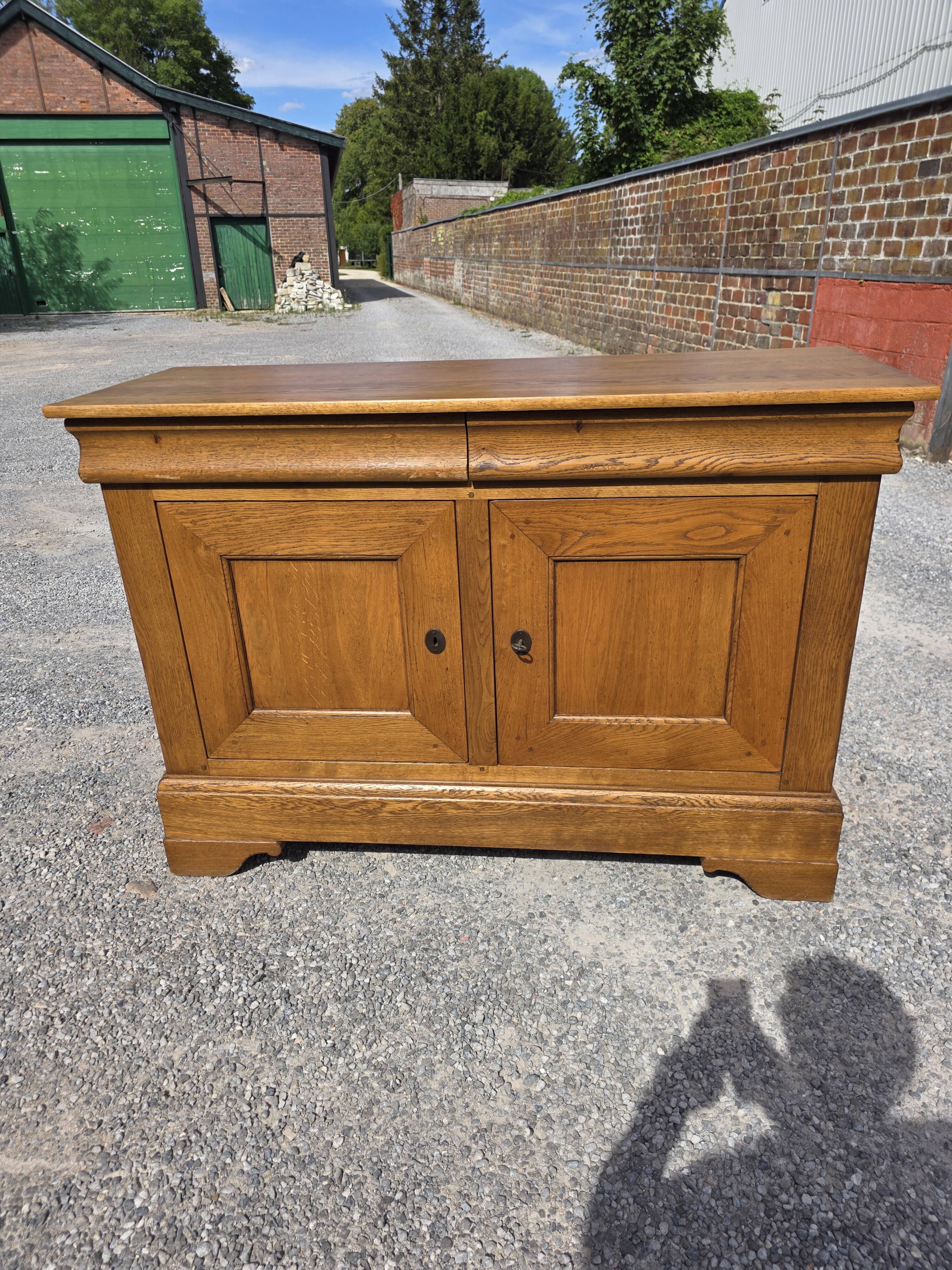 Louis Philippe buffet in solid oak.