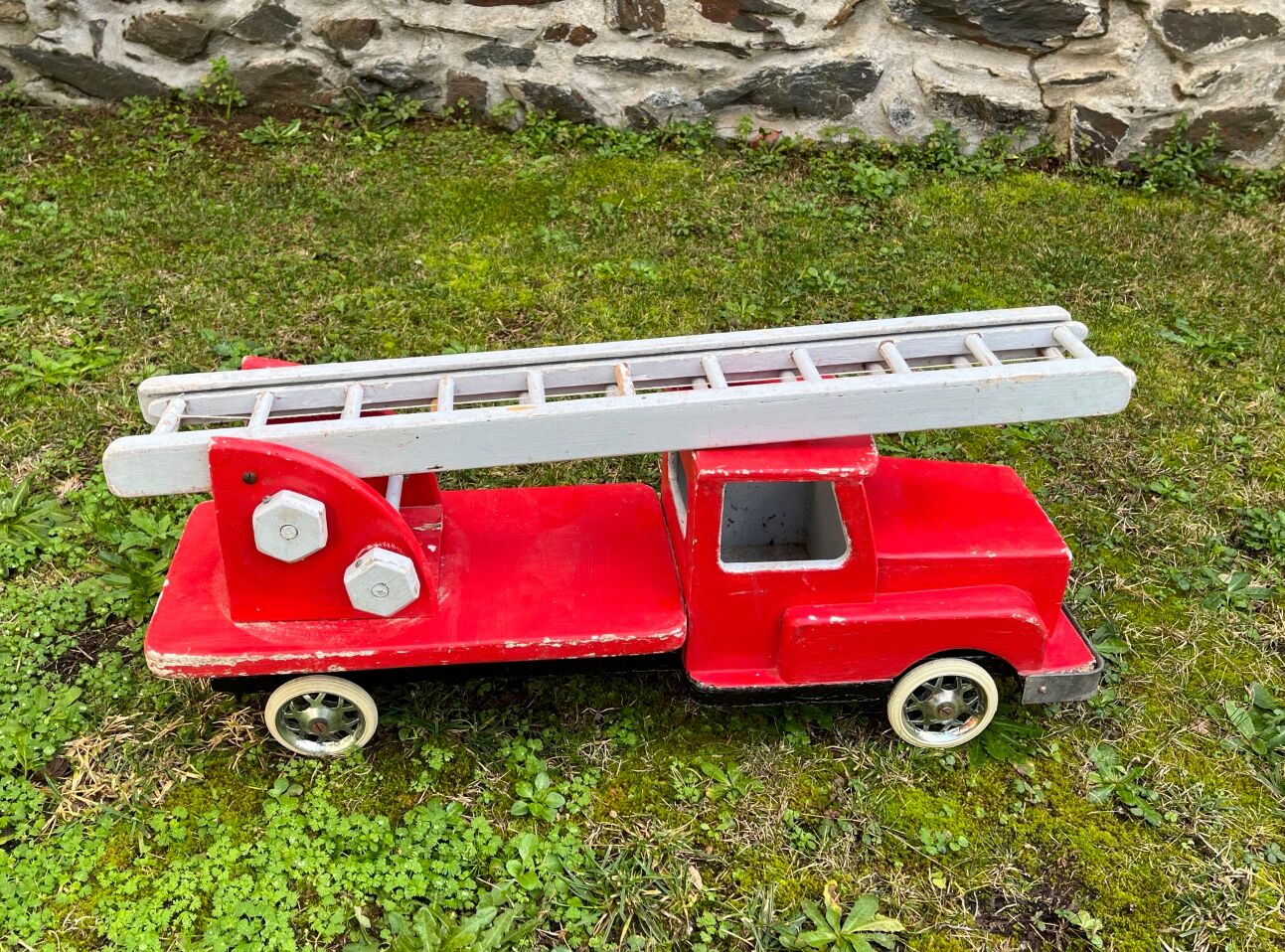 Fire truck with wooden ladder