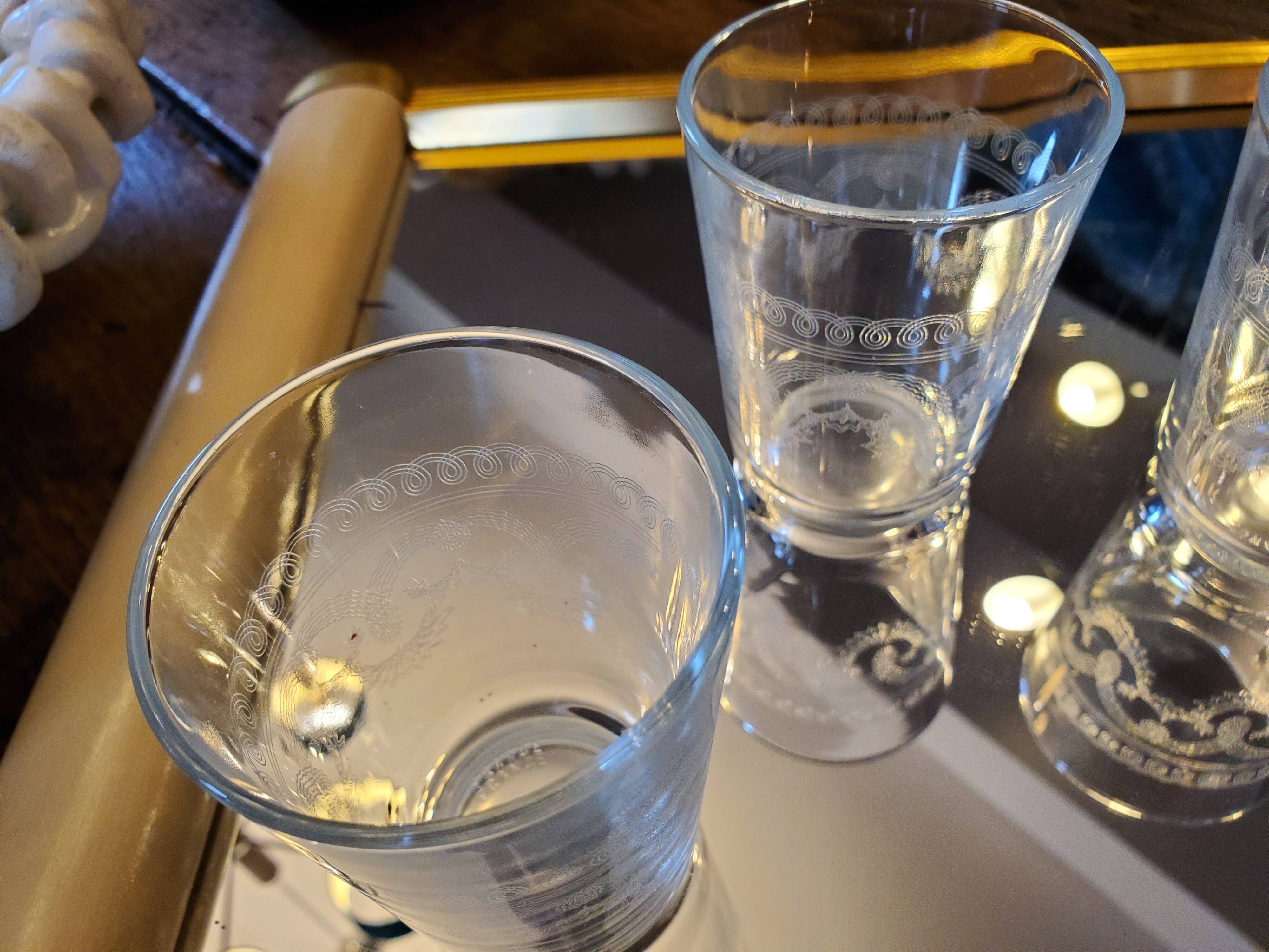 4 chiseled water glasses decoration arabesques and scrolls