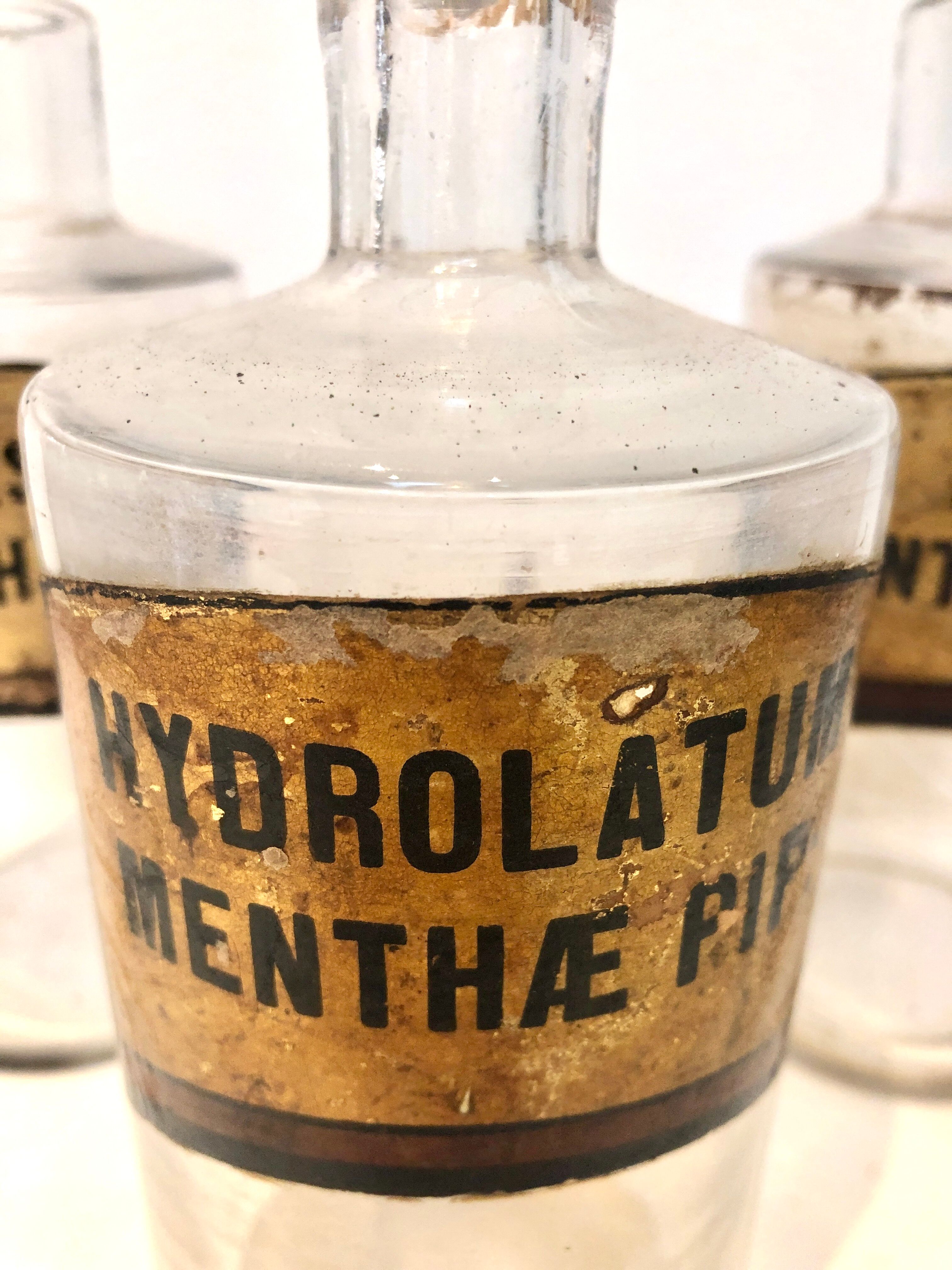 Trio apothecary bottles, early 20th