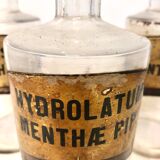 Trio apothecary bottles, early 20th