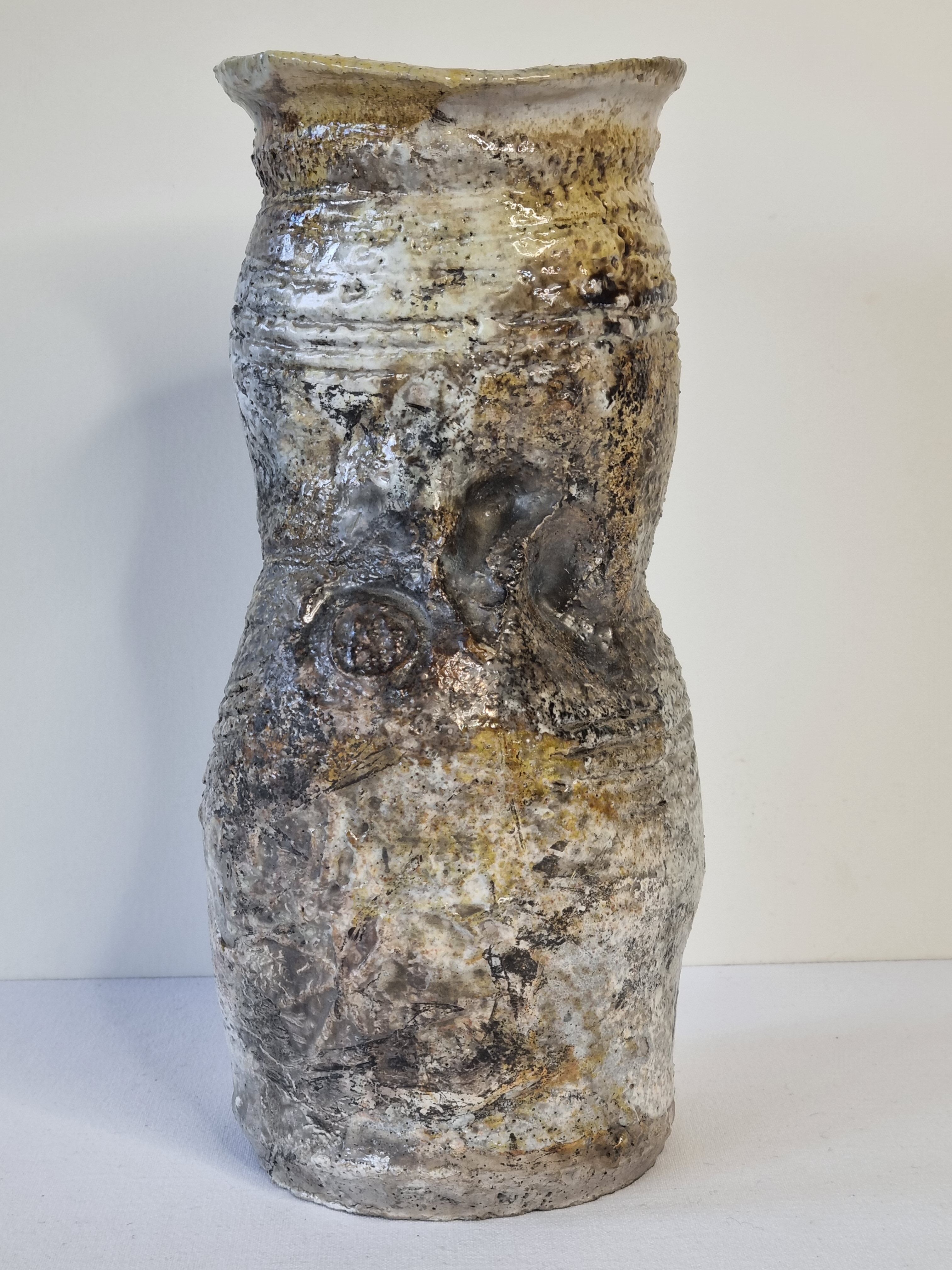 Enamelled ceramic roll vase