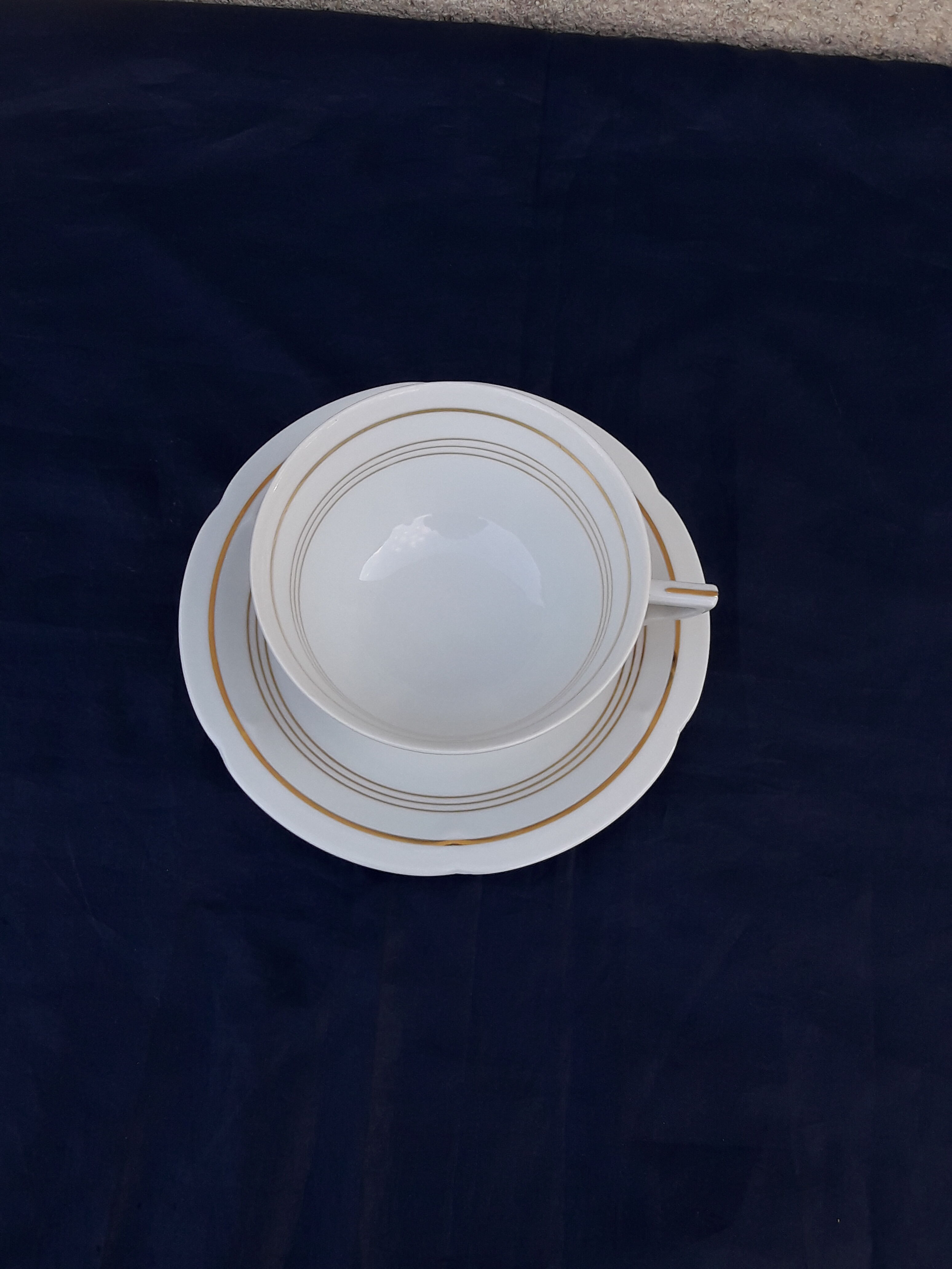 Tea cup with porcelain saucer from Limoges Charles Ahrenfeld bordered gilded