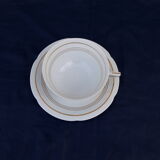 Tea cup with porcelain saucer from Limoges Charles Ahrenfeld bordered gilded