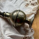 Oriental sprinkler in silver metal and brass