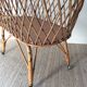 Vintage rattan cradle with its spire