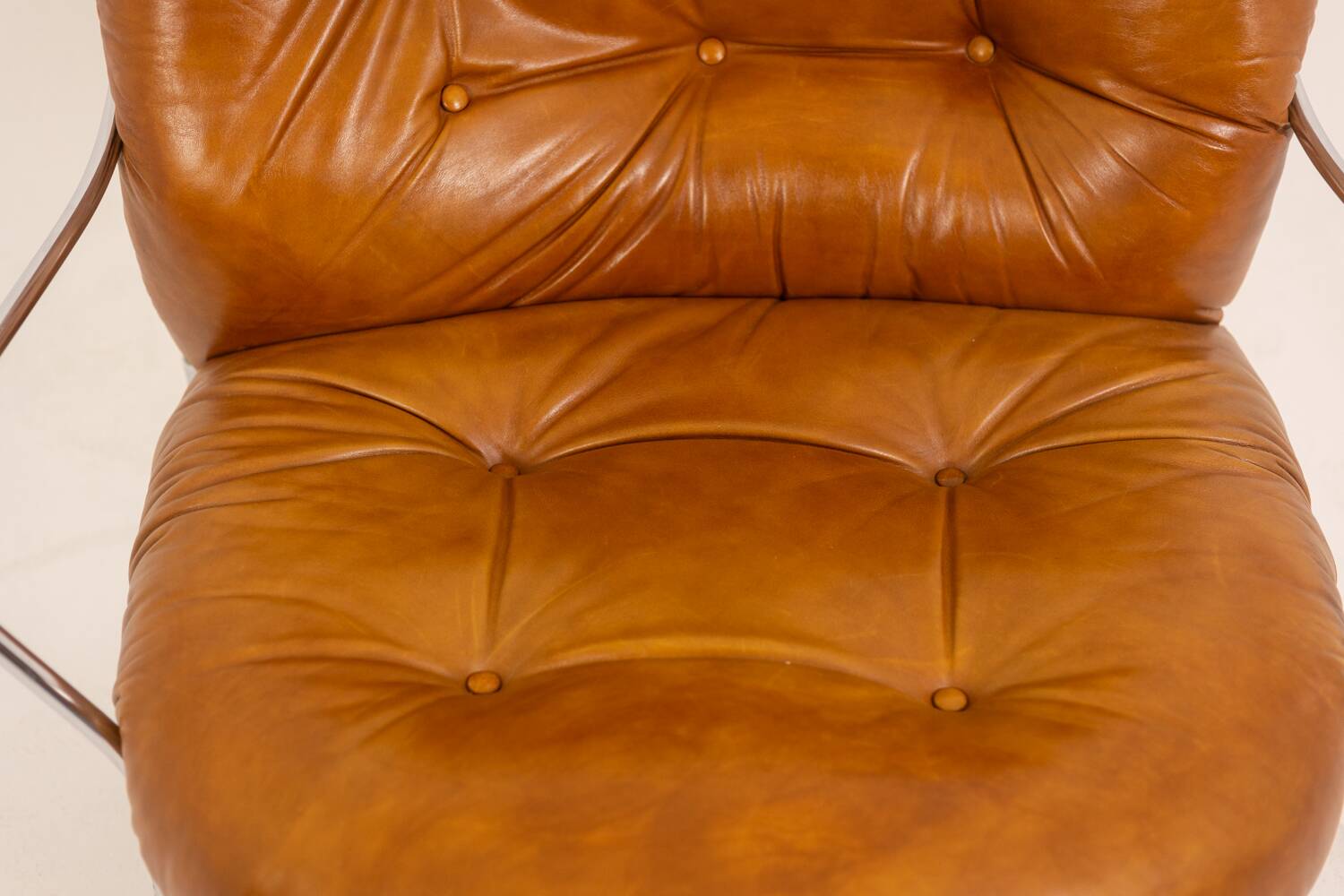 Carlo Di Carli. Leather and metal armchair. 1970s.