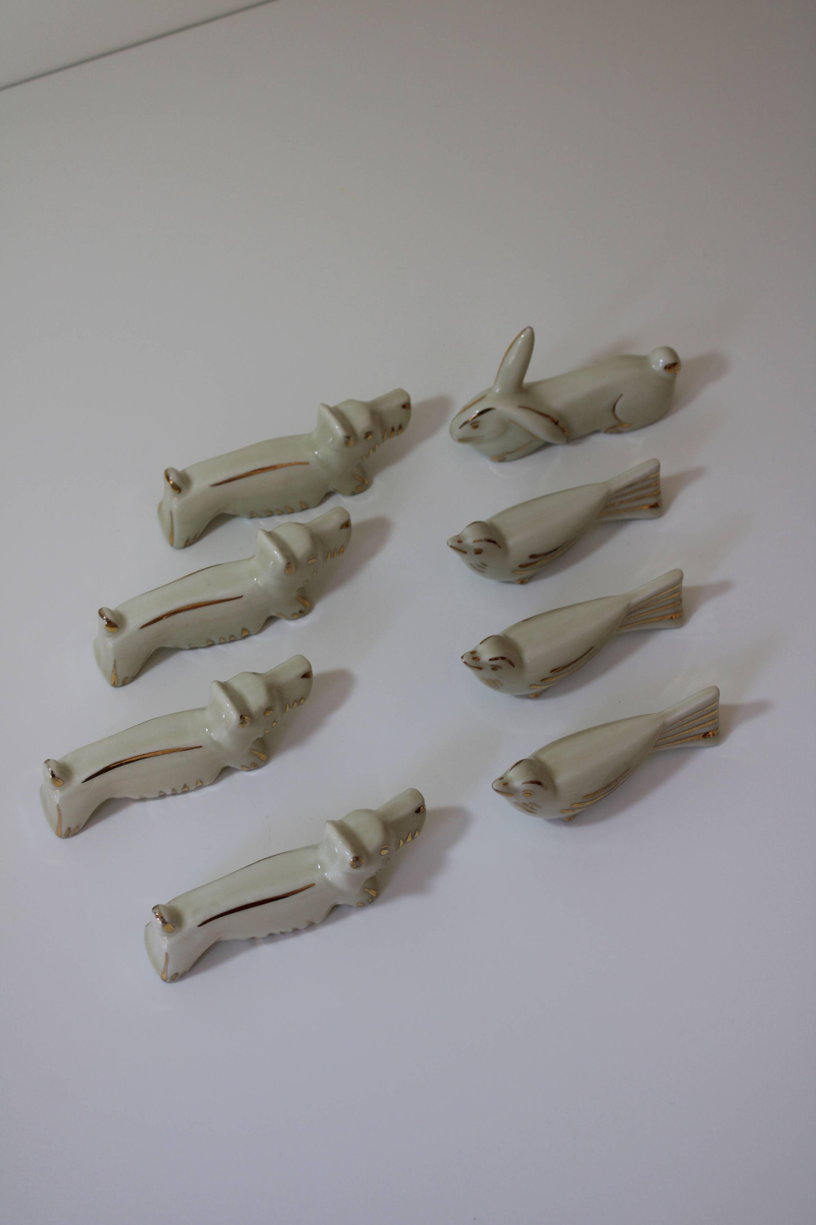 8 portes couteaux animaux porcelaine de Limoges vintage