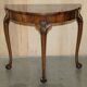 Console half-moon style Thomas Chippendale in flame mahogany.