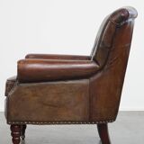 Classic grained cognac colored cowhide leather Chesterfield armchair