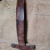 Old suitcase in canvas, wood and metal