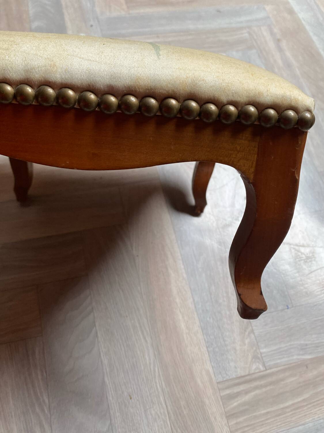 Vintage upholstered stool/footrest