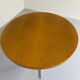 Old round table in solid wood and metal, vintage 70s design