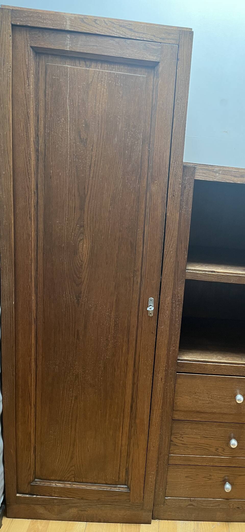 Wooden cabinet with drawers and shelves