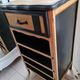 Raw oak and matte black storage cabinet on stencil top and transfer