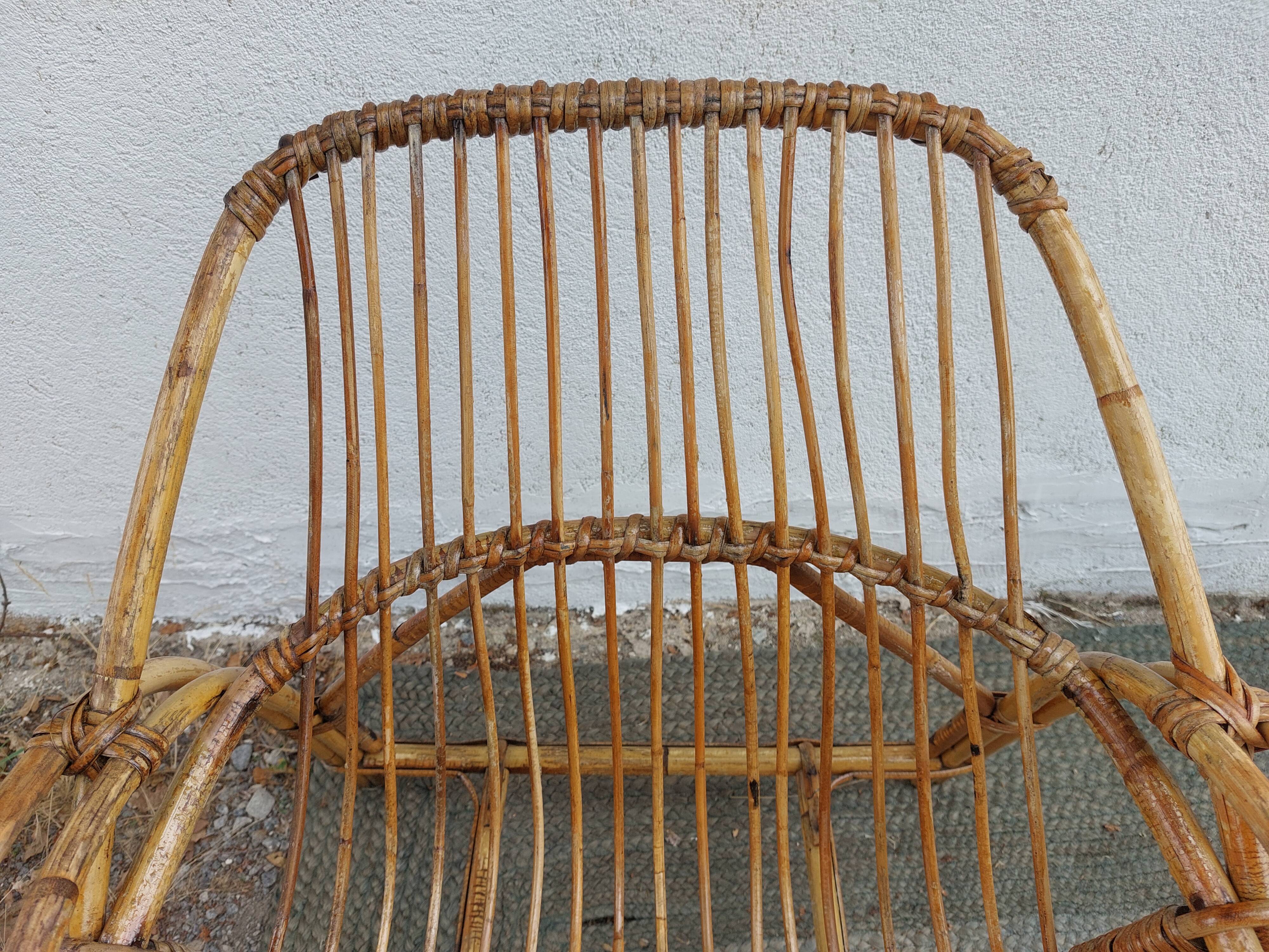 4 armchairs and a coffee table made of rattan and bamboo wood, vintage.