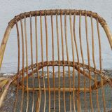 4 armchairs and a coffee table made of rattan and bamboo wood, vintage.