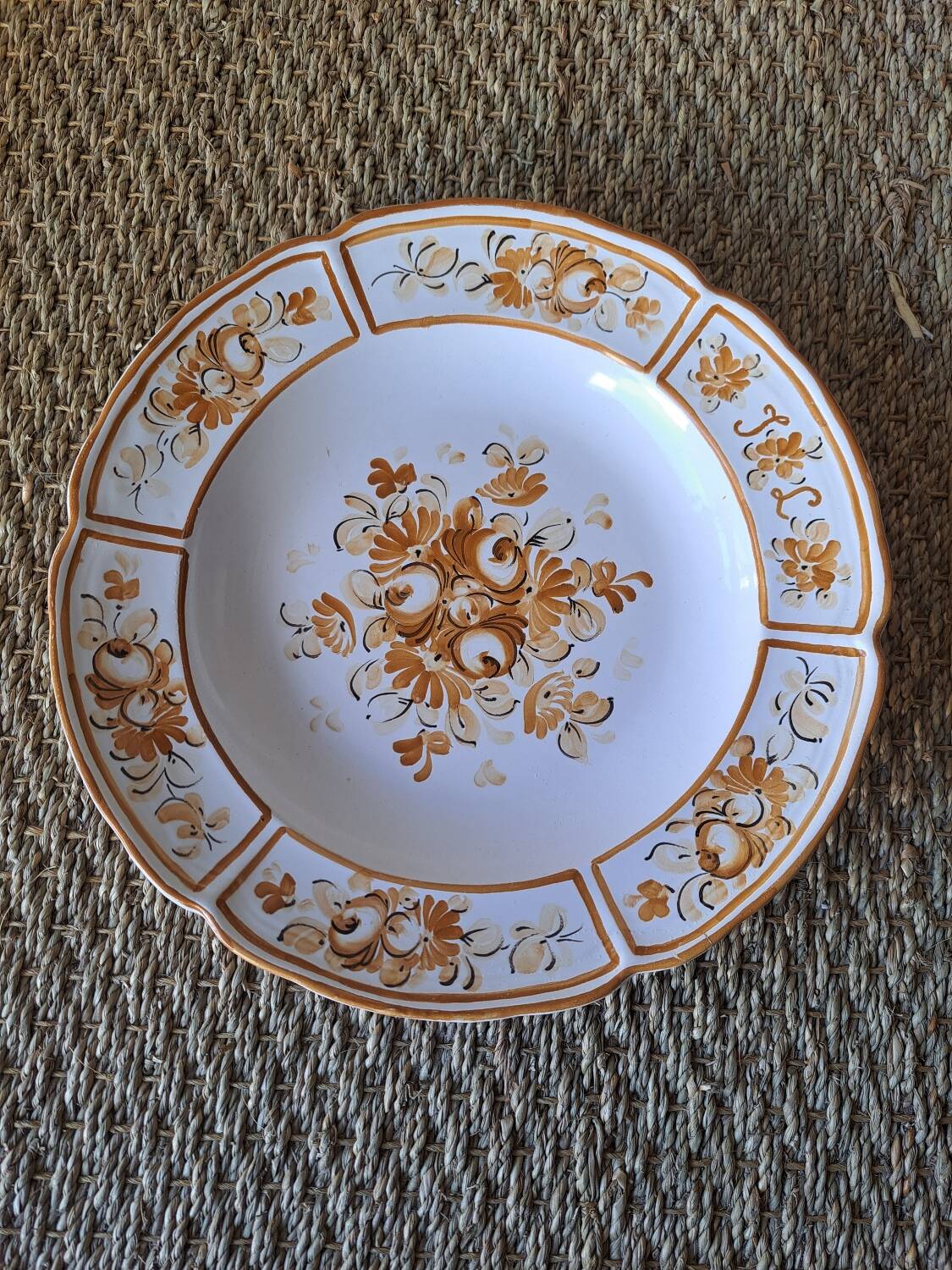 Old painted earthenware dish