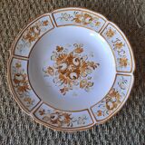 Old painted earthenware dish