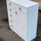 White, glossy lacquered wooden chest of drawers from the 1980s
