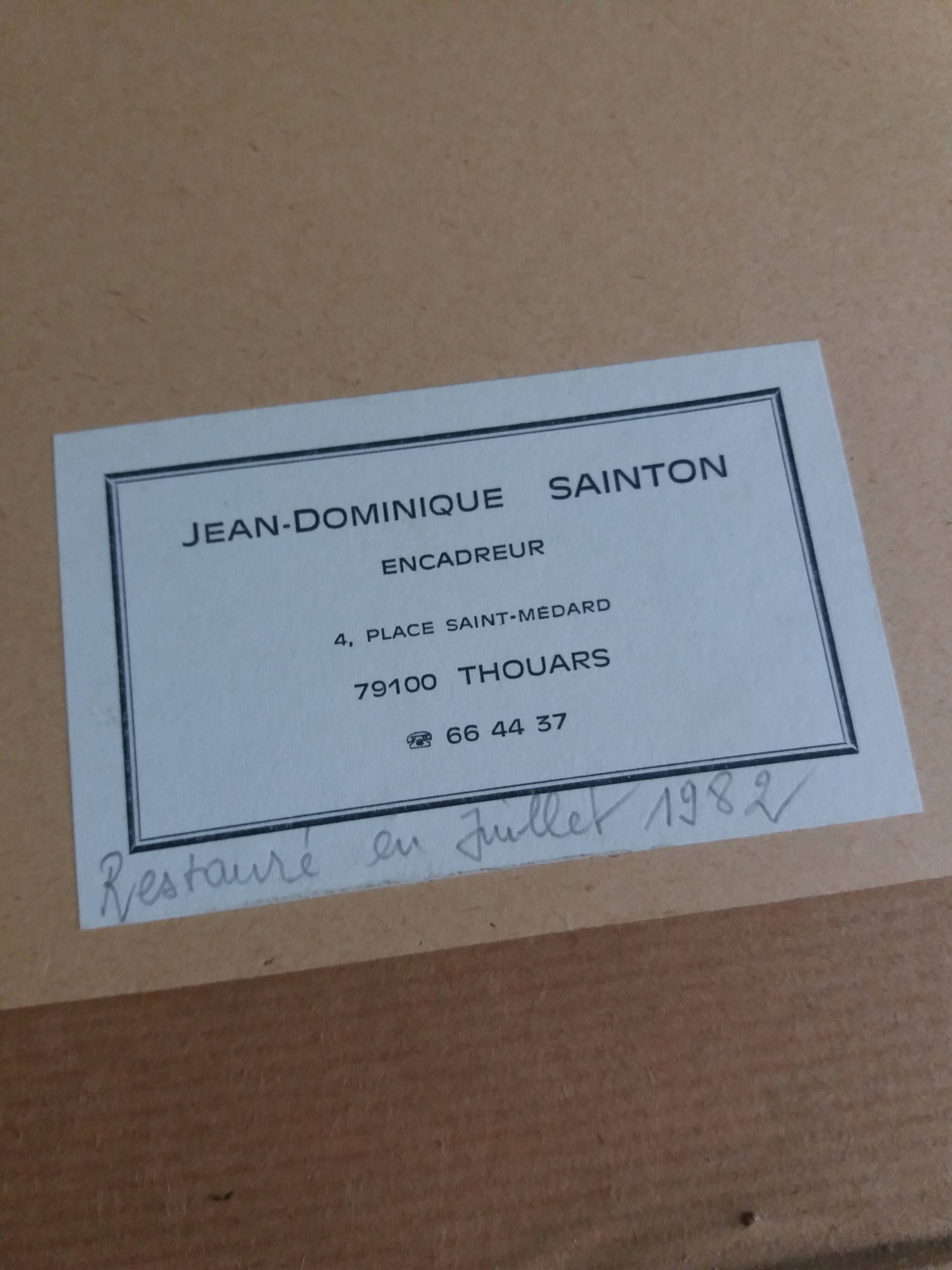 Old photo portrait framed in wood and stucco