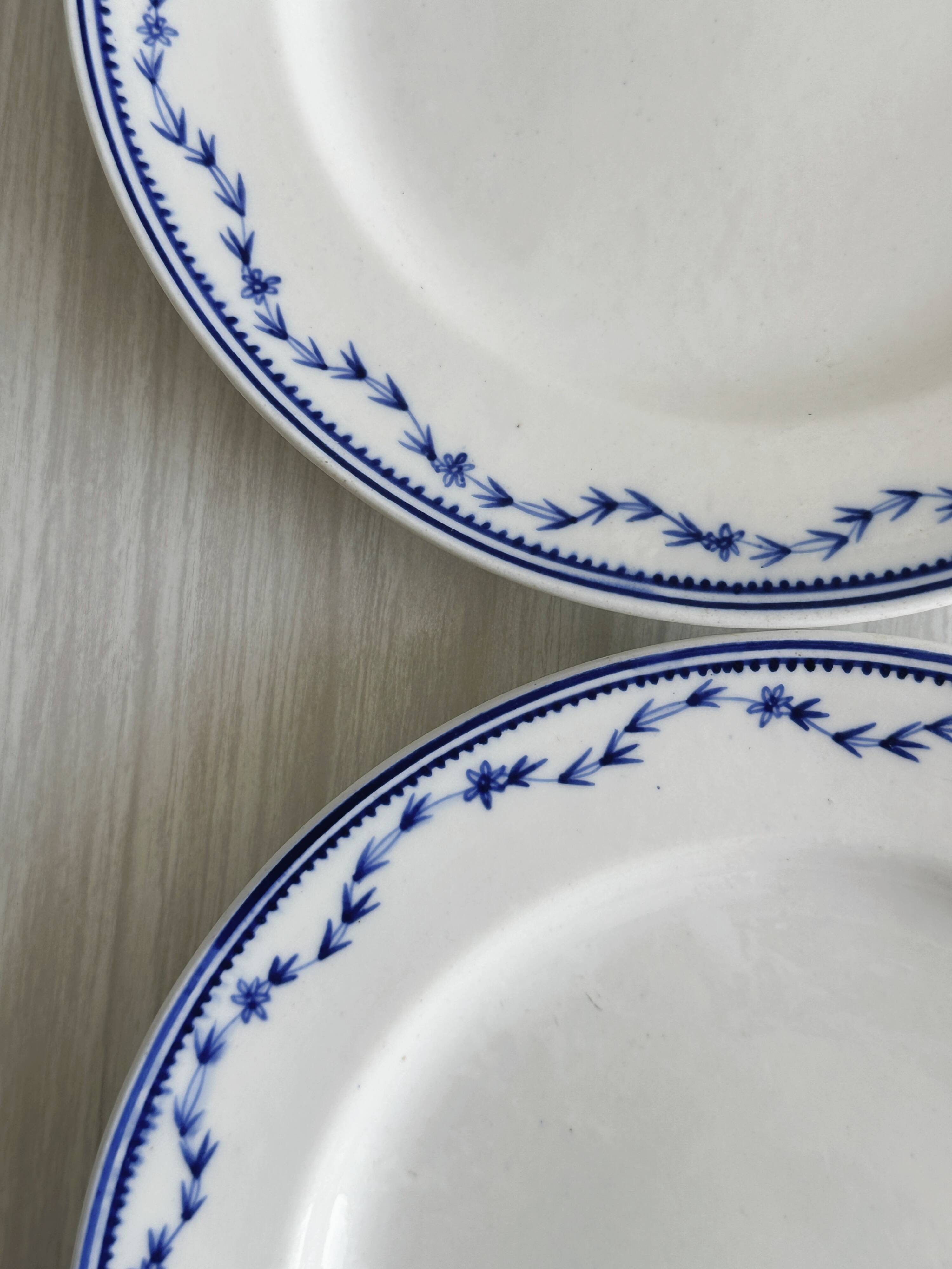 4 antique ceramic plates with blue flowers