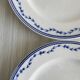 4 antique ceramic plates with blue flowers