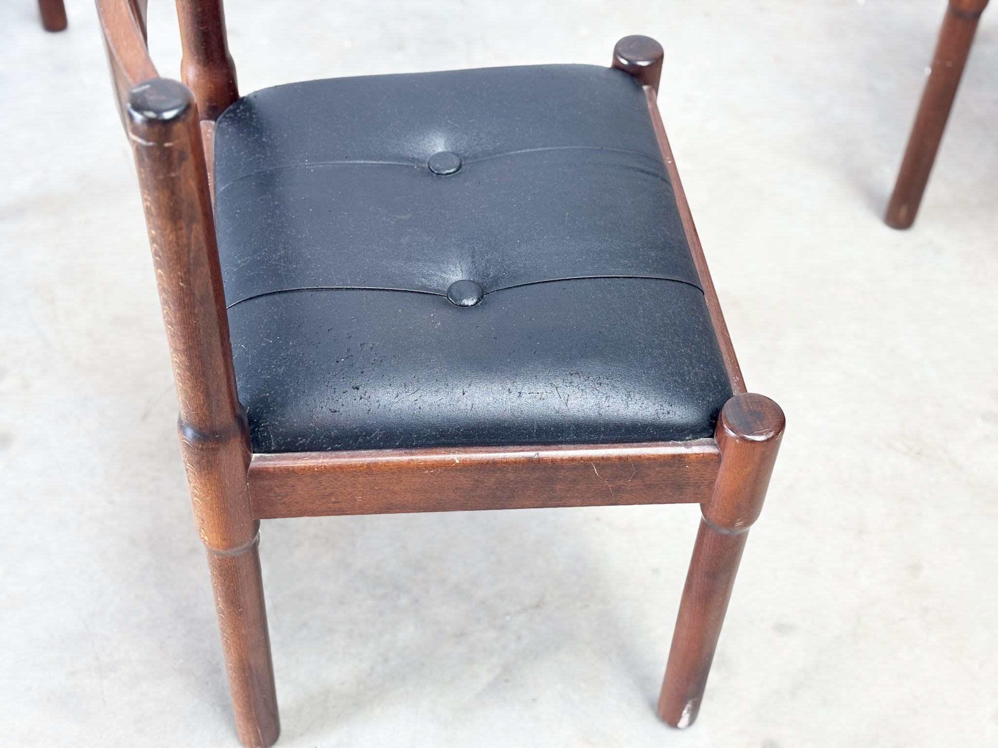 Set of six leather "Carimate" dining chairs by Vico Magistretti for Cassina