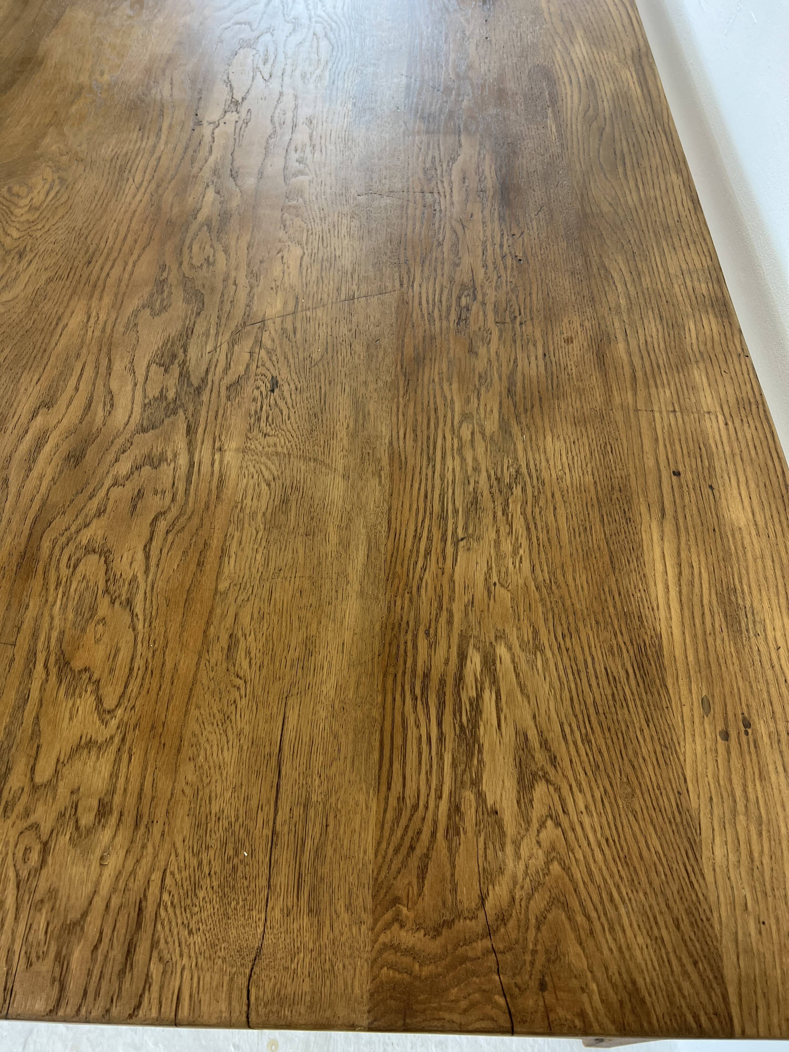 Two-sided oak work table, with 4 drawers