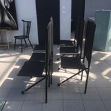 Set of 6 dining room chairs with tripod legs in grained leather and metal 1970