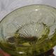 Old small cut on foot in yellow molded glass