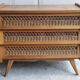 Wood chest of drawers and rattan cross, vintage, 60s