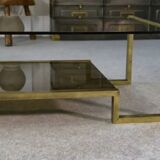 Designer coffee table with brass structure and black smoked glass, 1970s