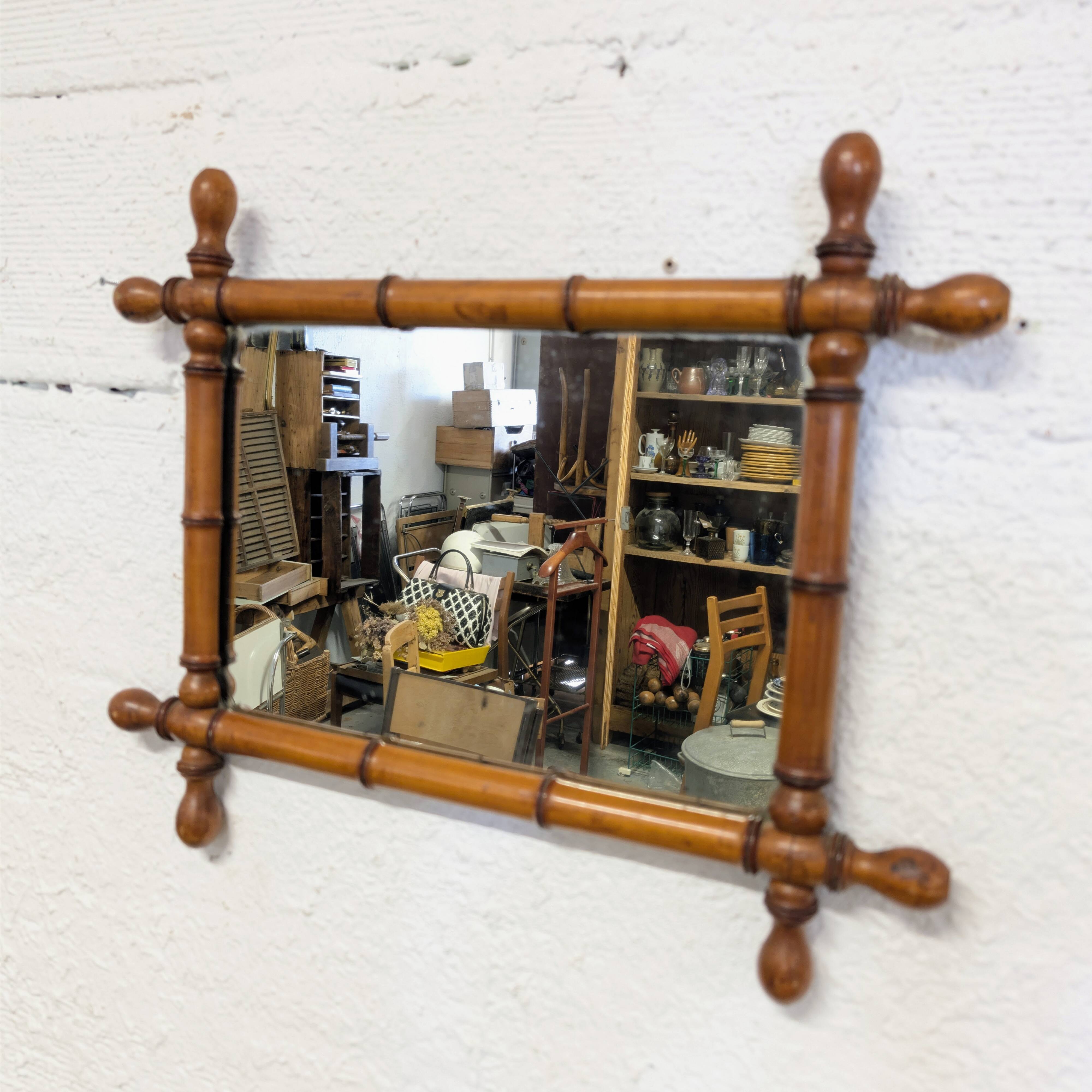 Antique turned wood mirror
