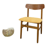 Scandinavian chair with mustard yellow fabric