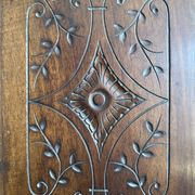 Pair of antique decorative panels in carved wood, late 19th century.