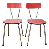 Duo of red formica chairs