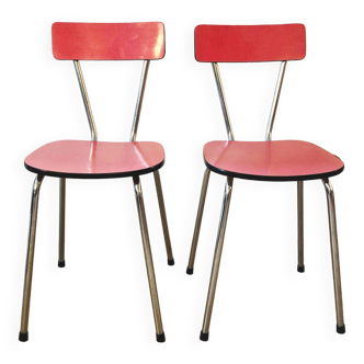 Duo of red formica chairs