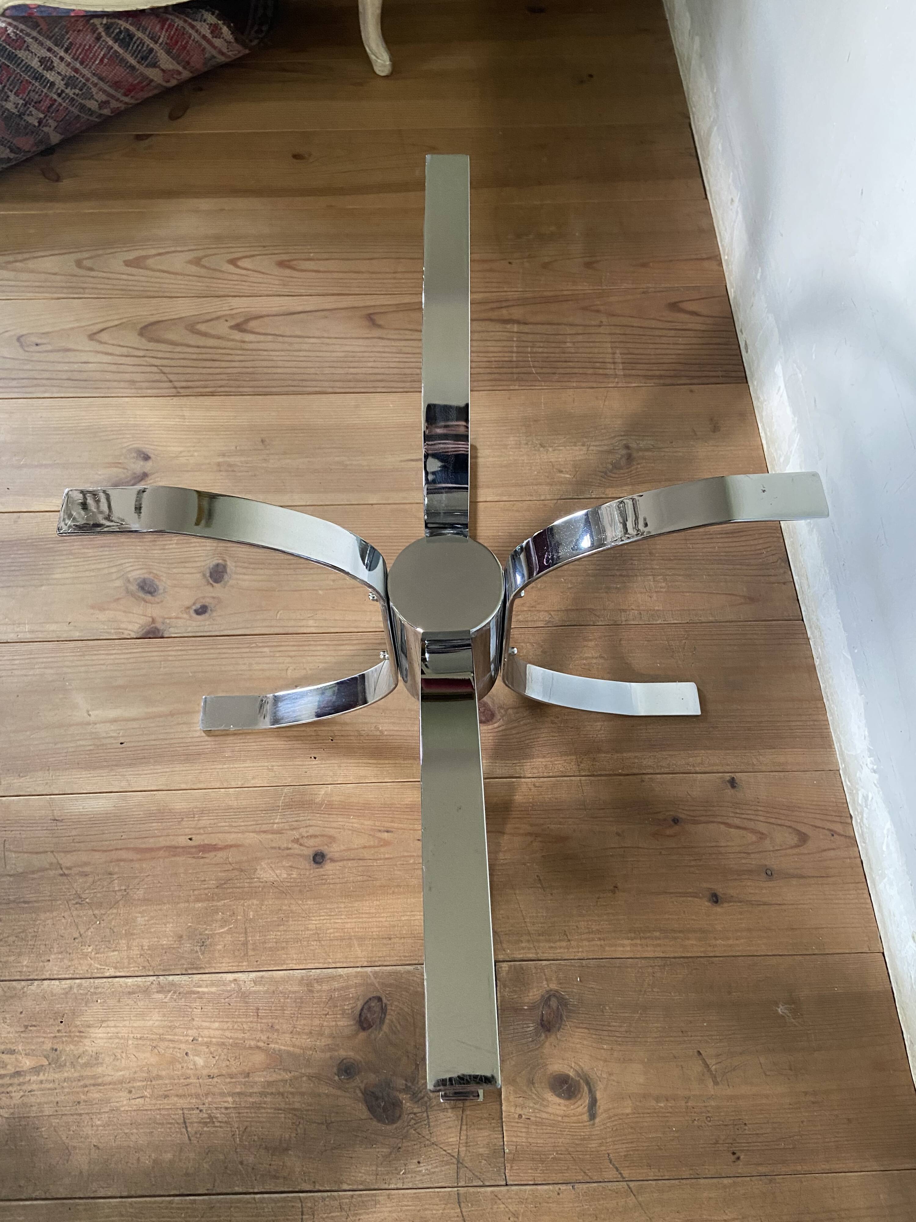 Modernist chrome and smoked glass table with tulip base from the 70s