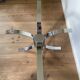 Modernist chrome and smoked glass table with tulip base from the 70s